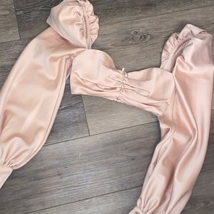 Pink satin long sleeve top with puffy, bellowed sleeves from House of CB